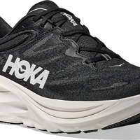 Quarter turn view Men's HOKA Footwear style name Gaviota 6 XWide in color Black/ White. Sku: 1171936-BWHT