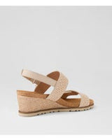 Ziera Kift wedge sandal in natural-toned raffia with adjustable straps, cushioned footbed, and mid-height wedge sole on a white background