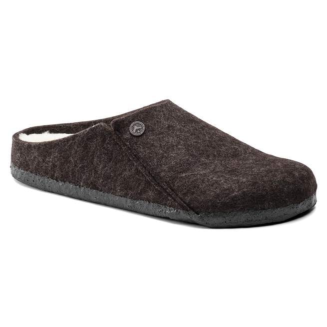 Brown slipper with white lining on a white background
