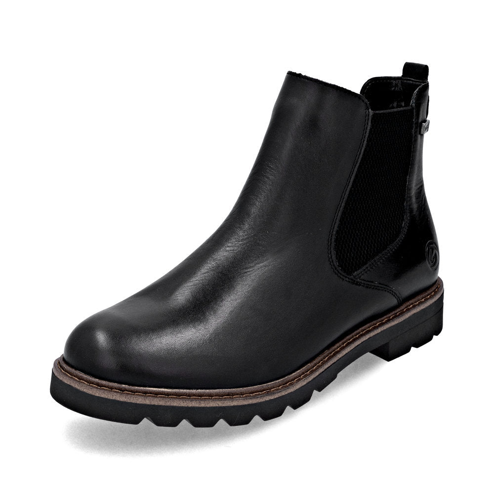 Black leather Chelsea boot on a white background