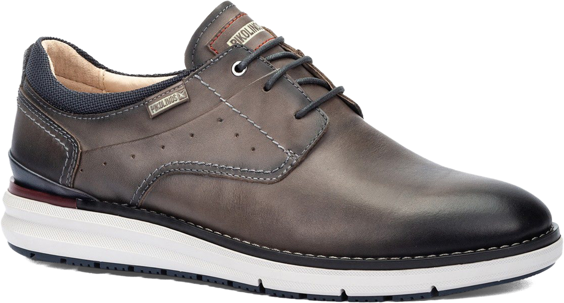 Brown leather shoe with white sole on a white background