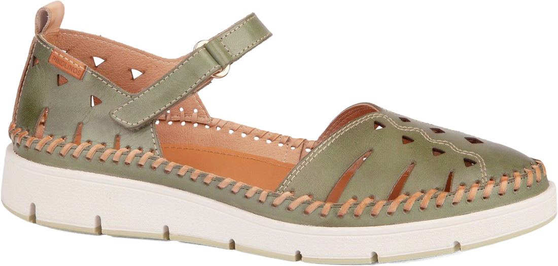 Green sandal with cut-out design on a white background