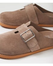clog in taupe suede leather with closed round toe, cushioned footbed with open back on a white background