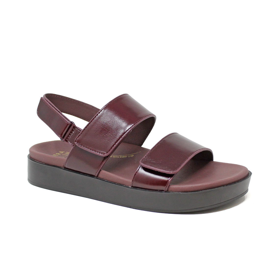 Maroon sandal with a platform sole on a white background